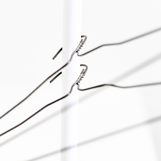 Plastic Hanger Paradox: Untangling Dry Cleaning's Eco-Hypocrisies for Progress